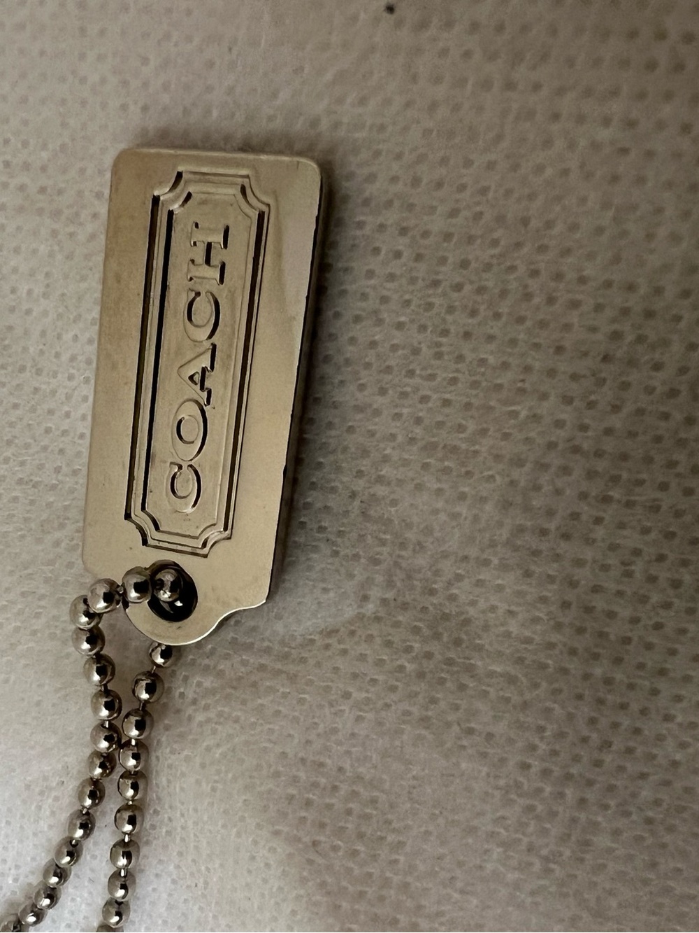 COACH Silver Metal Logo Hangtag